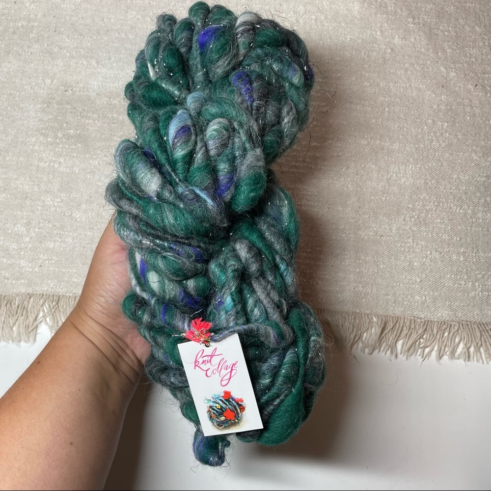 NWT - Knit Collage Hand
Spun Yarn. Super Bulky . Color - Forest Moon